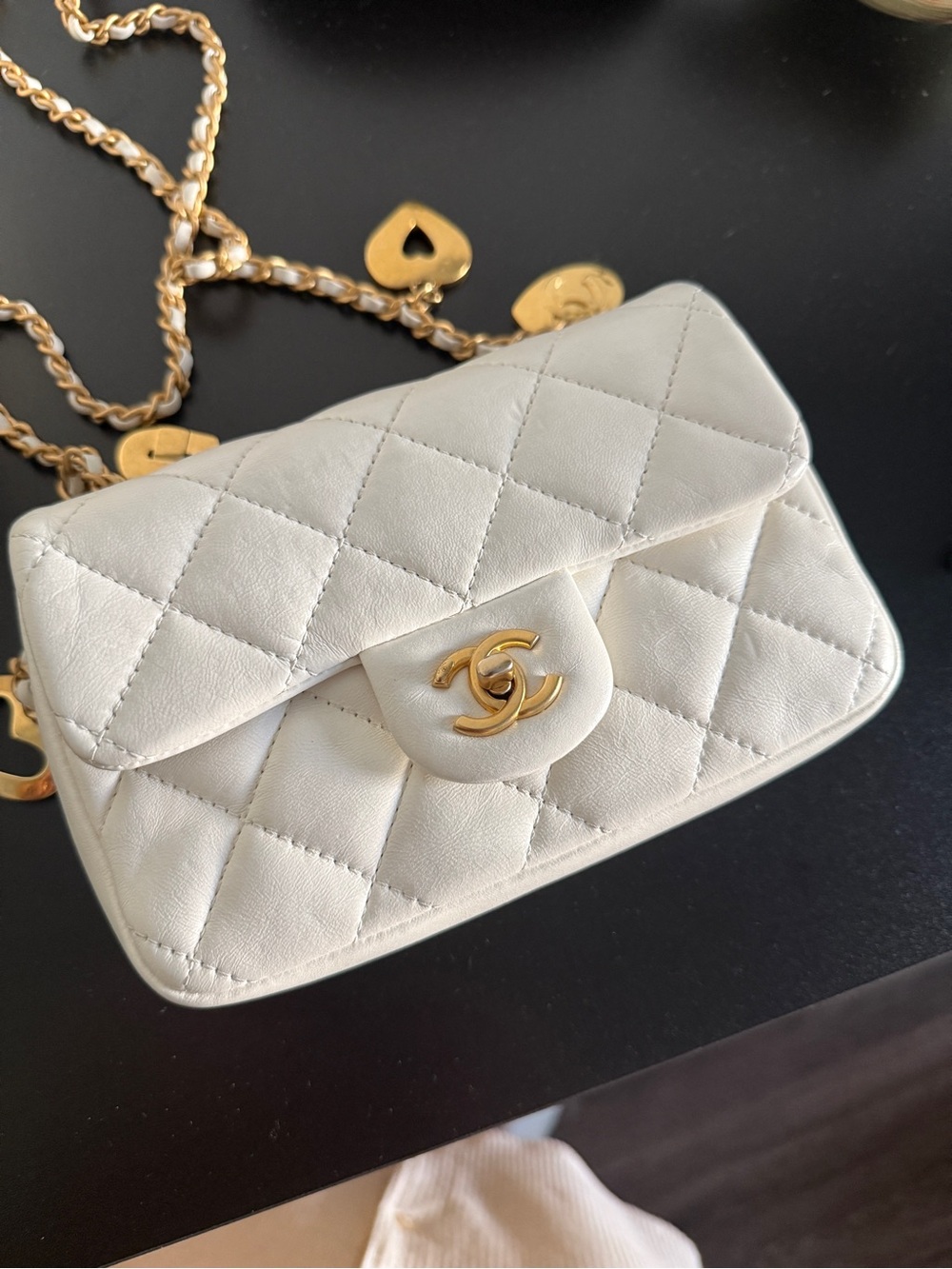 CHANEL White Quilted Mini Flap Bag with Gold Chain and CC Turn-Lock